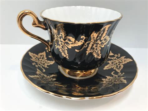 sutherland tea cup  saucer black tea cup english bone china