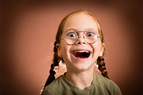 happyexcited  girl wearing nerdy glasses kinderdentist