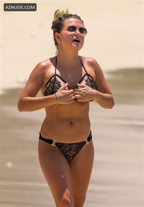 zara holland and mother cheryl hakeney are spotted on the beach in