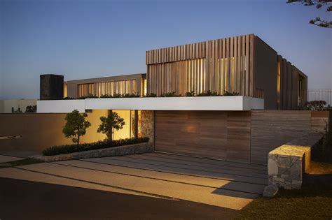 wooden facade modern house design  saota architecture beast