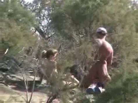 Horny And Naked Random People In The Bushes At The Beach Video