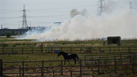 Smoke Pours From A Blaze In The Village Of Wennington East London