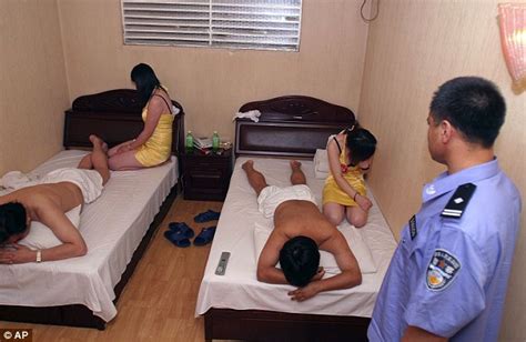 chinese officials forced to decide if happy endings in massage parlours are illegal daily