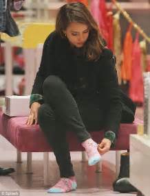 jessica alba takes a break from her daughters to browse sale racks with