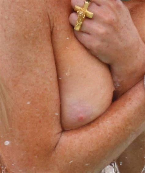 lindsay lohan bikini breast slip nude tit bathing suit malfunction