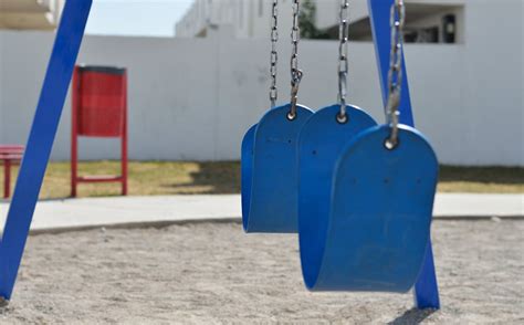 blue swing playground  stock photo