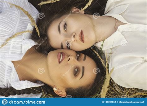 close up portrait of two girls protecting same sex relationships