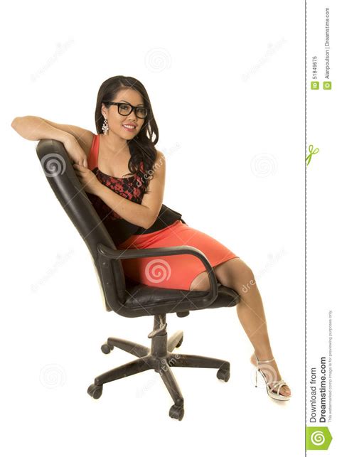 Asian Woman With Glasses In Dress Sitting Smile Stock