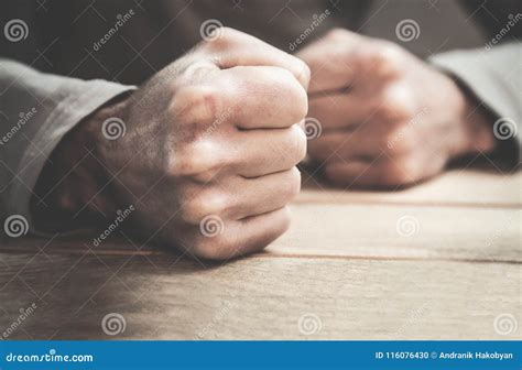 angry man fists   table stock photo image  people rage
