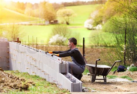 man building  house stock image colourbox