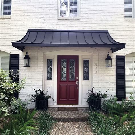 atawningdesign posted  instagram  black metal juliet door awning awningscopperawning