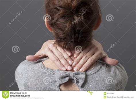 focus on female hands making a massage on tensed body