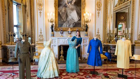 queen elizabeth s wardrobe exhibit will remind you she was a real life
