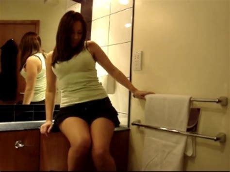 hot brunette pissing in a sink pissing porn at thisvid tube