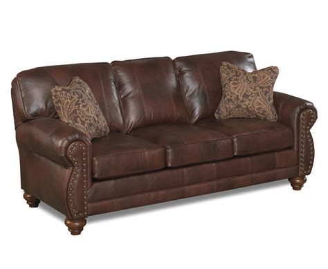 home furnishings noble stationary leather sofa  nailhead trim rifes home furniture
