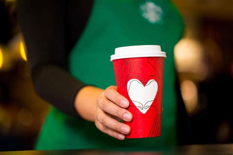 starbucks launch new christmas cups after same sex design controversy the independent