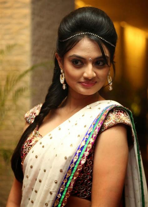kerala mallu sexy actress nikira narayan bulging exposing latest photoshoot stills in white