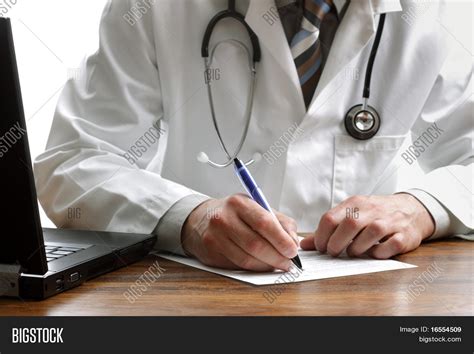 doctor writing patient image photo  trial bigstock