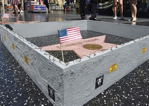 artist built a wall around donald trump s walk of fame star