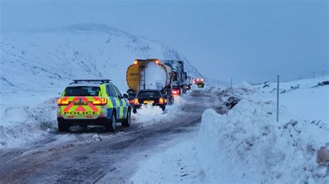 uk weather heavy snow warnings  drivers stuck   metre snowdrifts rescued uk news sky