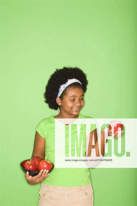 African American Girl Holding Apples Y