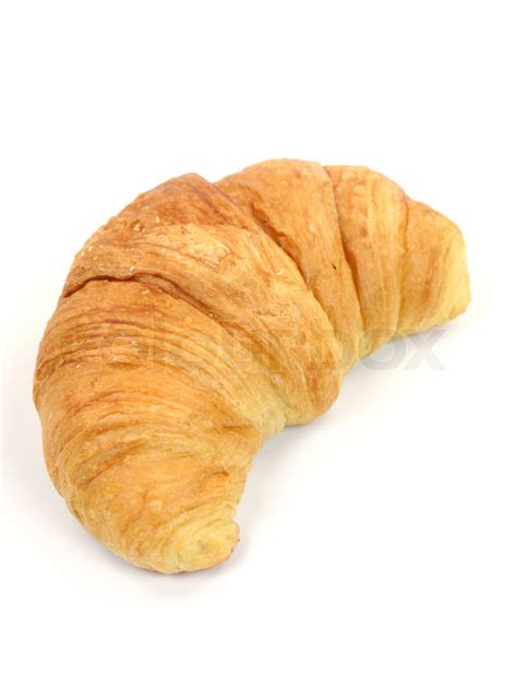 ein croissant vor einem weissen hintergrund isoliert stock bild