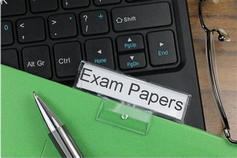 exam papers   charge creative commons suspension file image