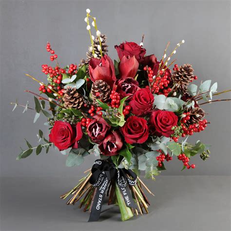 red christmas bouquet  flower stand chelsea