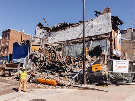 building under demolition collapses in old city