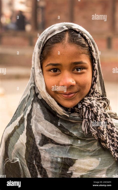A Young Newari Girl Poses For A Portrait In Hanuman Dhoka Durbar Square