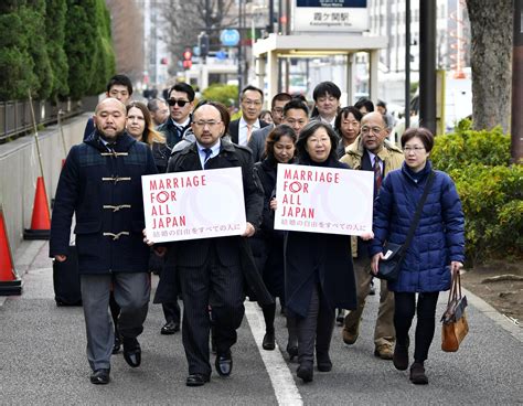 in a first lgbt couples sue japan over constitutionality