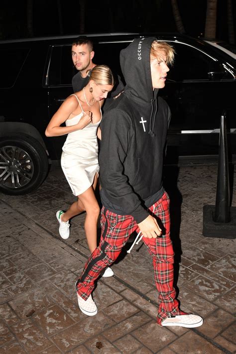 hailey baldwin wears a slip dress at a club in miami with justin bieber