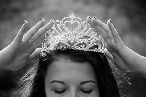 woman holding silver colored crown queen crowning luxury princess elegance crown