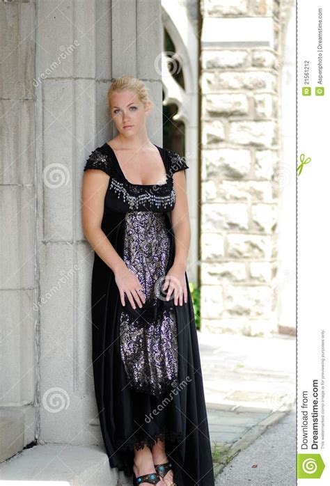 Beautiful Blonde Woman In Vintage Black Dress Stock