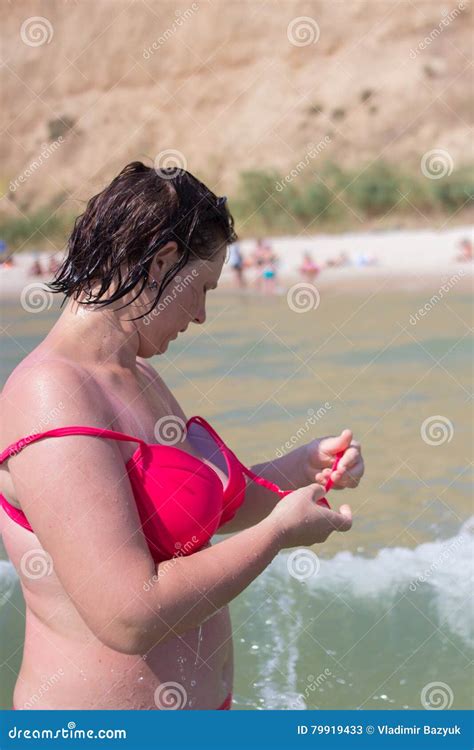 woman in the torn swimsuit stock image image of occasion 79919433