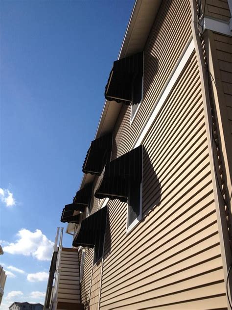 custom window awnings provide    amount  shade  protect  home