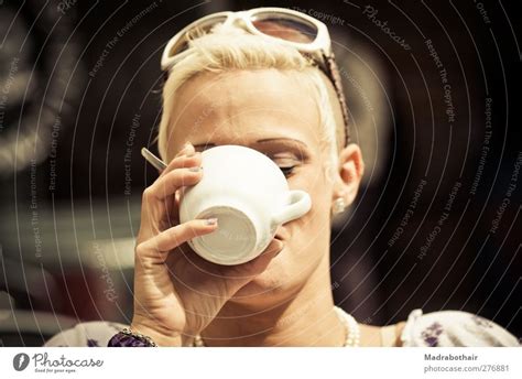 Junge Frau Trinkt Einen Kaffee Ein Lizenzfreies Stock Foto Von Photocase