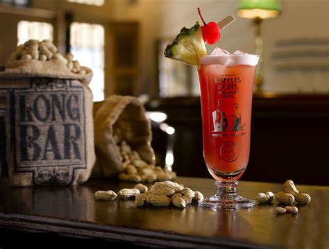raffles hotel s iconic singapore sling returns home to the long bar