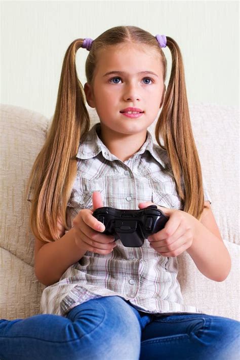 girl playing video game stock photo image  computer
