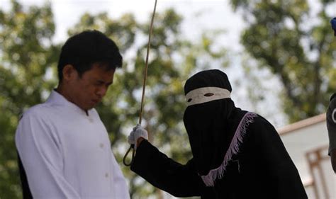 sharia law punishment adulterers publicly whipped in indonesia world news uk