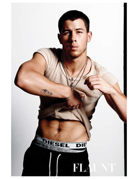 nick jonas wears jewelry and not much else on flaunt s sexy cover story