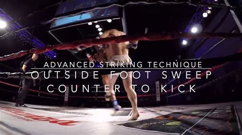 muay thai technique outside foot sweep counter to kick