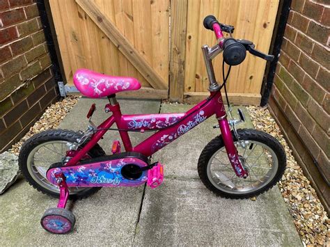 girls butterfly bike   wheels  stabilisers  leeds west yorkshire gumtree