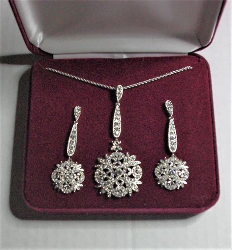 jackie kennedy winter crystal jewelry set necklace  earrings  silver box  certificate