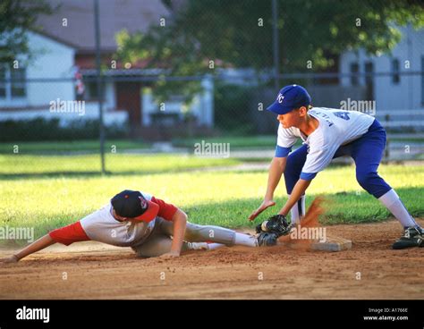 action baseball player sliding  base stock photo alamy
