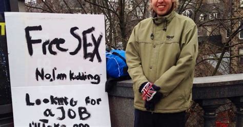 Unemployed Man Holds Up Free Sex Sign In Street In Bid To Get Job