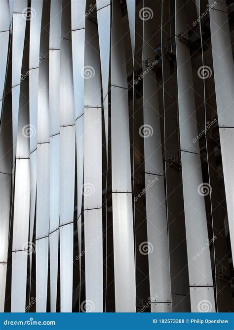 modern stylish steel vertical curved panels  vertical pattern exterior cladding stock photo