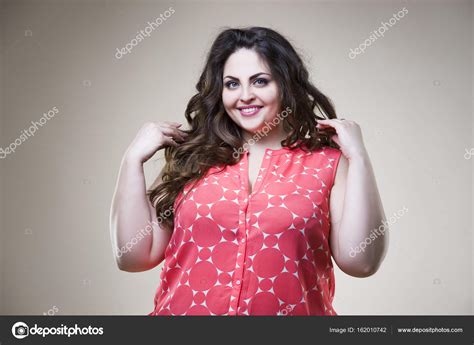 Happy Plus Size Fashion Model In Casual Clothes Fat Woman On Beige