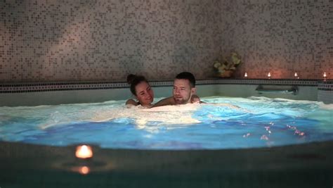 Couple On A Date At The Beautiful Swimming Pool In The Sauna Stock