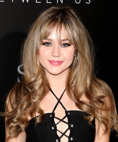 Brec Bassinger Voluminous Long Wavy Formal Hairstyle With